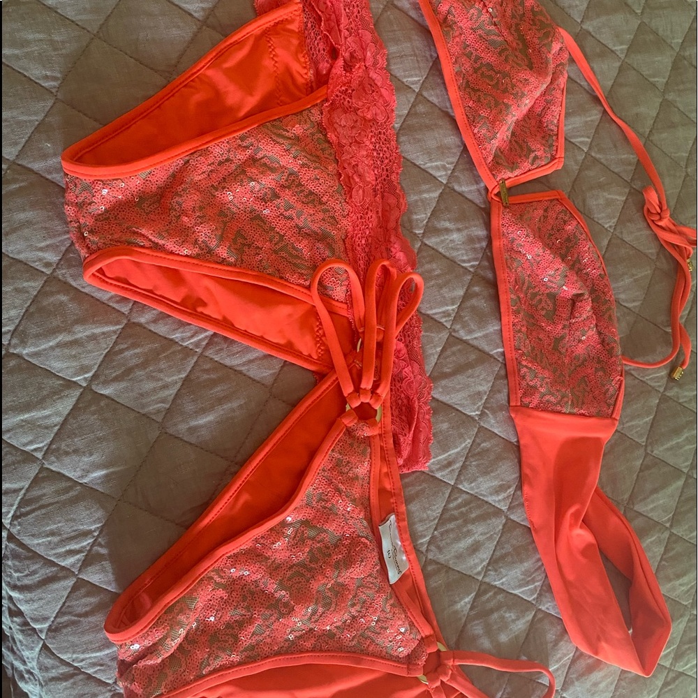 Beach bunny bikini top and two bottoms.